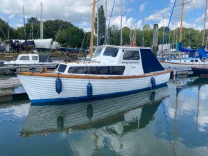 Classic wooden cabin boat for sale